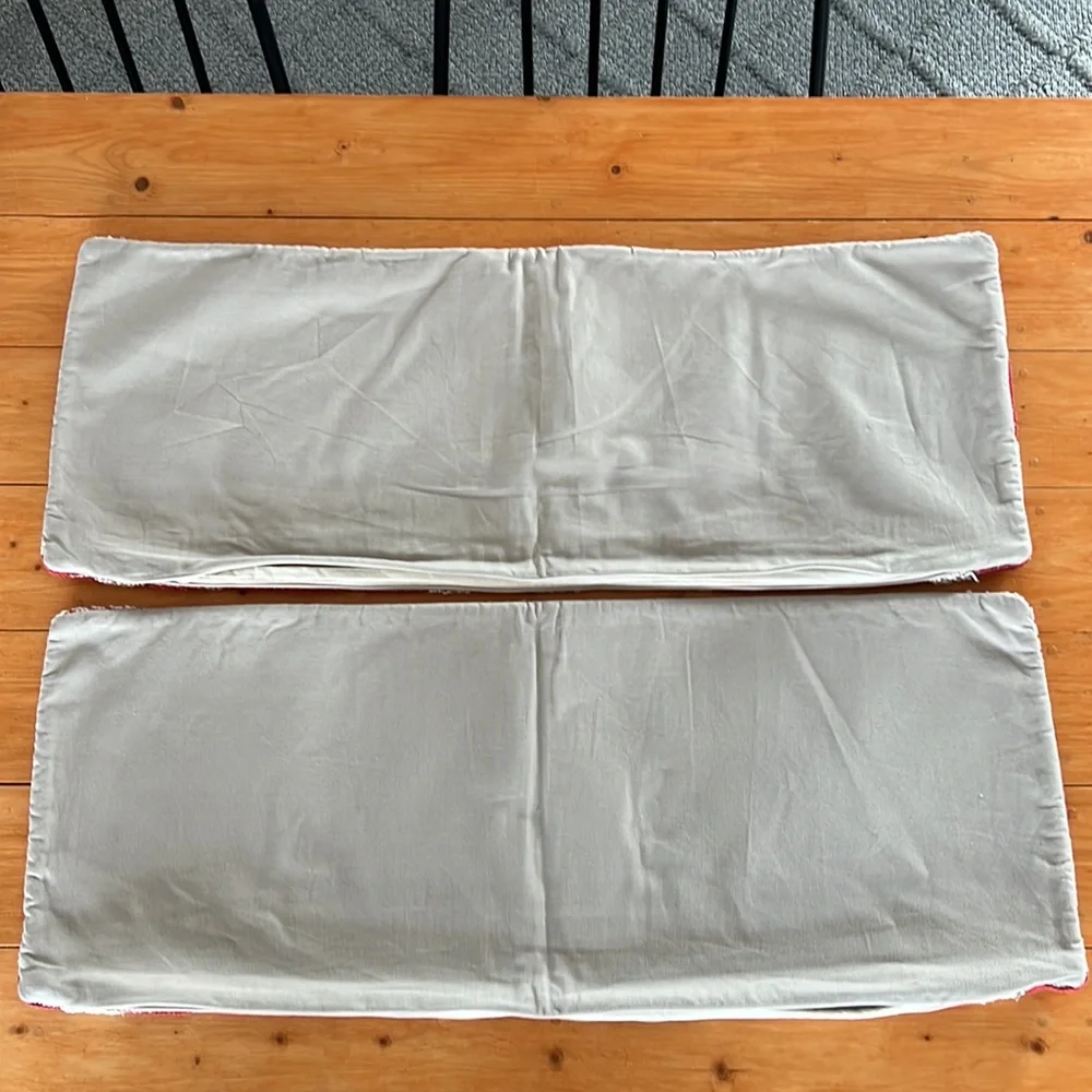 2 NWT West Elm lumbar pillow covers in cream & rust color. Both 14” x 36”